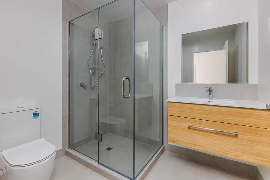 Tasman Drive — Bathroom with walk-in shower
